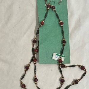 Costume jewelry. 50” necklace and earrings.